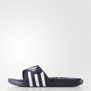 The adidas adissage Slides feature an adjustable strap, massage nubs on the footbed, and an injected EVA outsole for post-swim comfort.