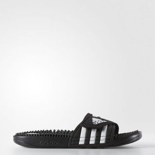 The adidas adissage Slides provide quick-drying comfort and foot massage with adjustable synthetic bandage upper, TPR footbed, and injected EVA outsole.