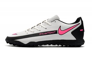 The Nike Phantom GT Club TF Football Boots are precision-engineered to thrive on artificial turf surfaces, providing players.