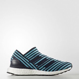 The soccer field with the adidas Nemeziz Tango 17+ UltraBOOST Shoes in Blue, designed for players who take risks and refuse to be contained.