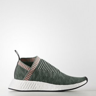 The adidas NMD_CS2 Primeknit Shoes Green, featuring an engineered one-piece Primeknit upper for a sock-like fit inspired by innovative technology.