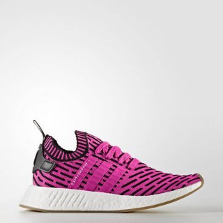 Step into the future of sneaker design with the adidas NMD_R2 Primeknit Shoes Pink, combining contemporary style and innovative functionality.