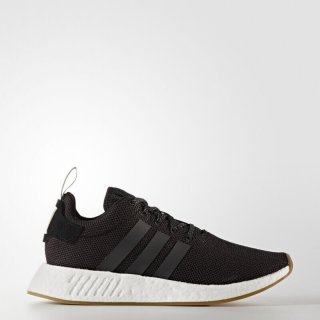 Experience the Ideal fusion of heritage style and innovative design with the adidas NMD_R2 Shoes in Black, just like the style embodying Liberty Football.