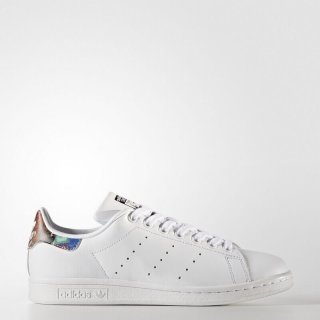 The women\'s adidas Stan Smith Shoes White, designed with The FARM Company, feature a leather upper and brightly colored heel patch for a distinctive style.
