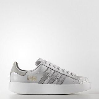 Step up your fashion game with the adidas Superstar Bold Platform Shoes in Grey, featuring a thick platform outsole and luxurious leather details.