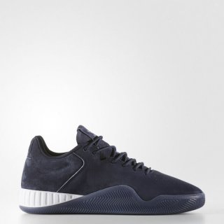 The adidas Tubular Instinct Low Shoes in blue offer a timeless blend of vintage style and modern design, inspired by the Purdue basketball legacy.