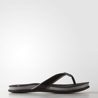 Experience comfort & style with the adidas Supercloud Plus Flip-Flops, featuring an extra-soft footbed and durable construction for ultimate summer relaxation.