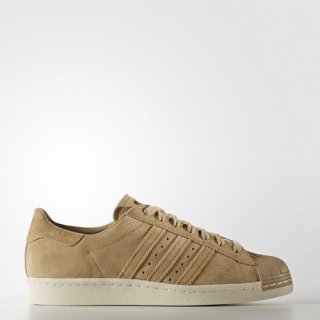 adidas Superstar 80s Suede Shoes, featuring a vintage-look suede upper, classic rubber shell toe, and iconic branding for a timeless and fashionable look.
