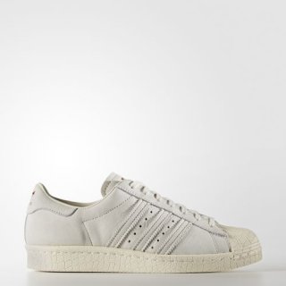 The adidas Superstar 80s Shoes Chalk White embody the iconic status and timeless style of the original hardwood classic.