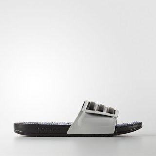The adidas adissage 2.0 Slides feature massage nubs for comfort and a quick-dry adjustable bandage upper, providing relief for tired feet.