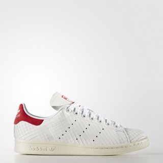 The adidas Stan Smith Tennis Sneaker, featuring a fashion-forward Italian sliced leather upper and iconic design elements that make a statement on.