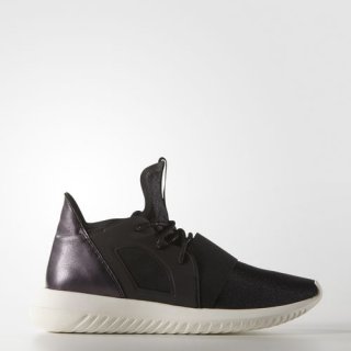 Elevate your sneaker game with the adidas Tubular Defiant Sneakers, boasting a bold design and metallic details for a fashionable and modern look.