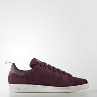 Step into sophistication with the adidas Stan Smith Shoes Maroon, featuring a sleek suede upper and iconic design for a timeless, elevated sneaker.